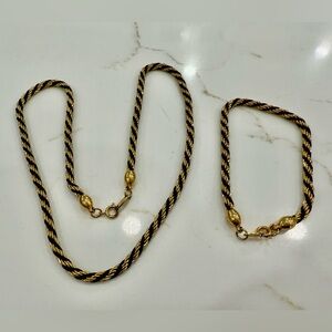 Gold and black metal necklace and bracelet set